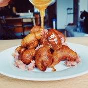 Plantain Fritters with bacon & rum caramel sauce